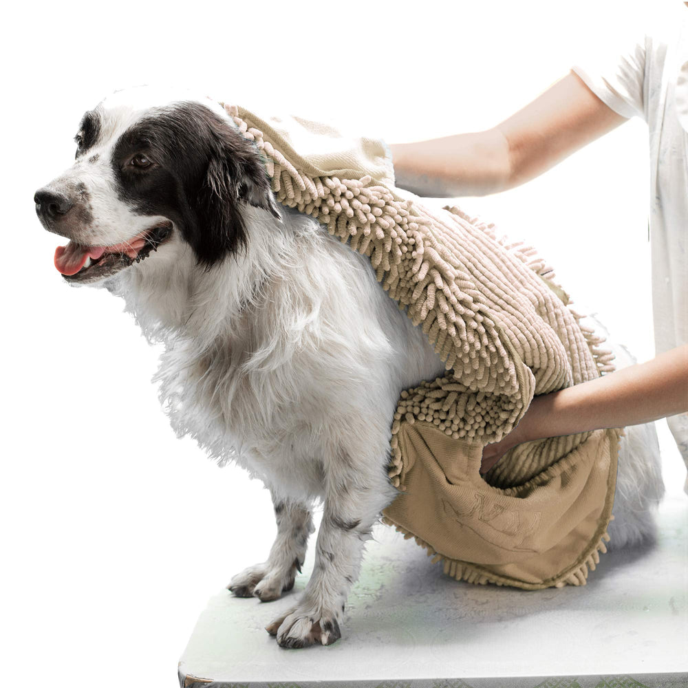Tuff Pupper Quick Dry Towel close-up shows ultra absorbent microfiber soaking up water quickly
