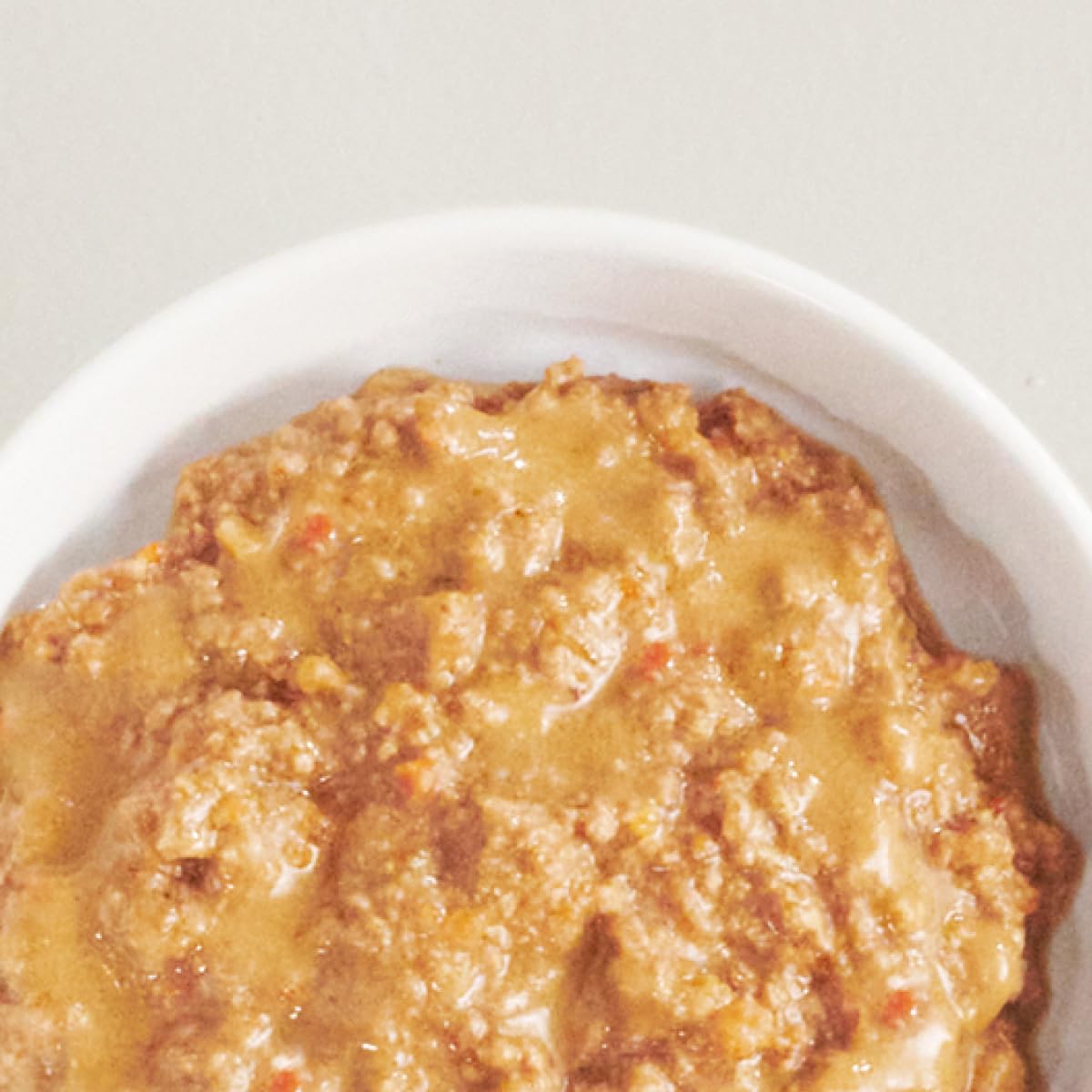TUFT + PAW ingredients closeup emphasizes pumpkin and salmon oil for digestion and coat health.