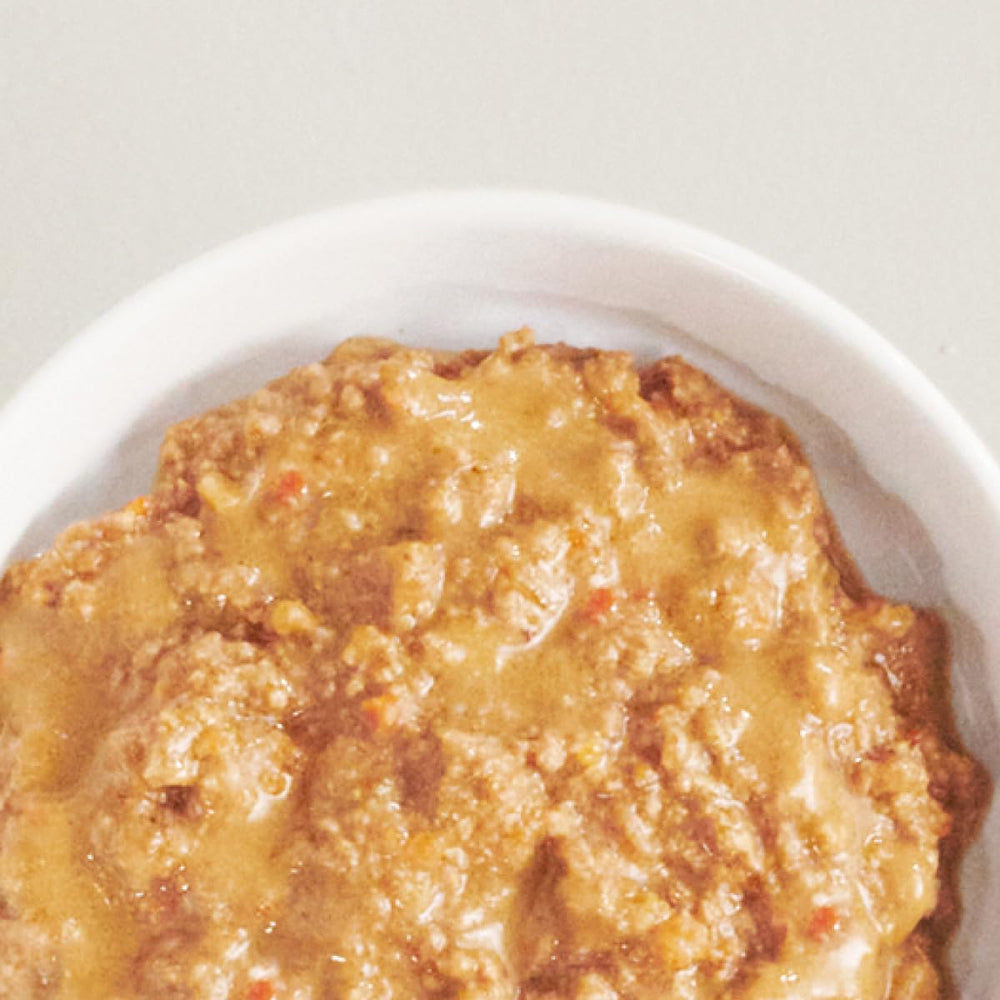 TUFT + PAW ingredients closeup emphasizes pumpkin and salmon oil for digestion and coat health.