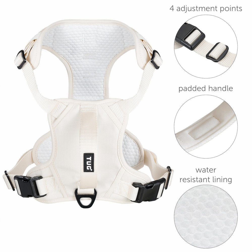 TUG dog harness back handle in cream provides quick control in crowded spaces