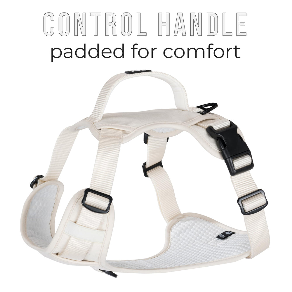 TUG dog harness water-resistant nylon shell stands up to city walks and rainy days.
