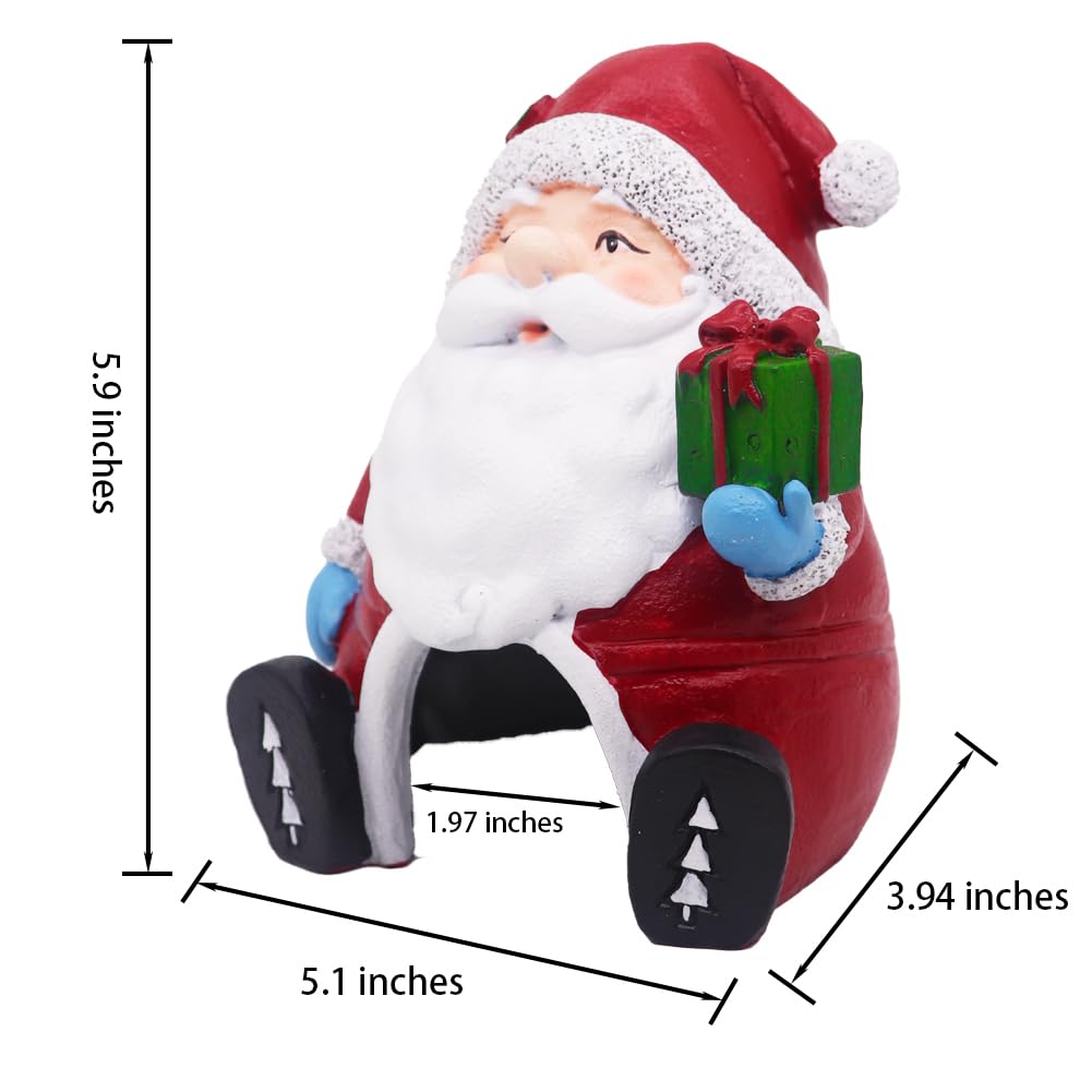 Ulifery betta hiding Santa ornament creates secure retreat amid festive decor.