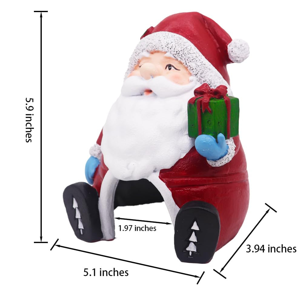 Ulifery betta hiding Santa ornament creates secure retreat amid festive decor.