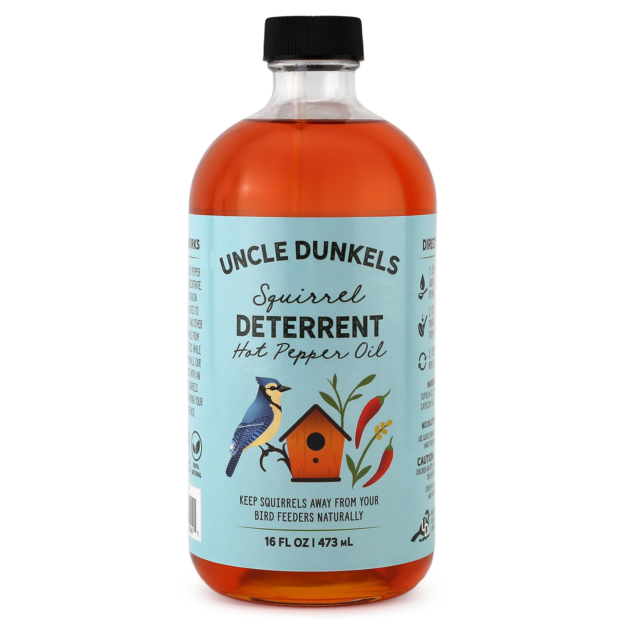 Uncle Dunkels spicy pepper deterrent bottle close-up showing natural seed protection for birds.