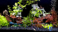 UNEAK shipwreck aquarium ornament side view highlights resin texture and painted details.