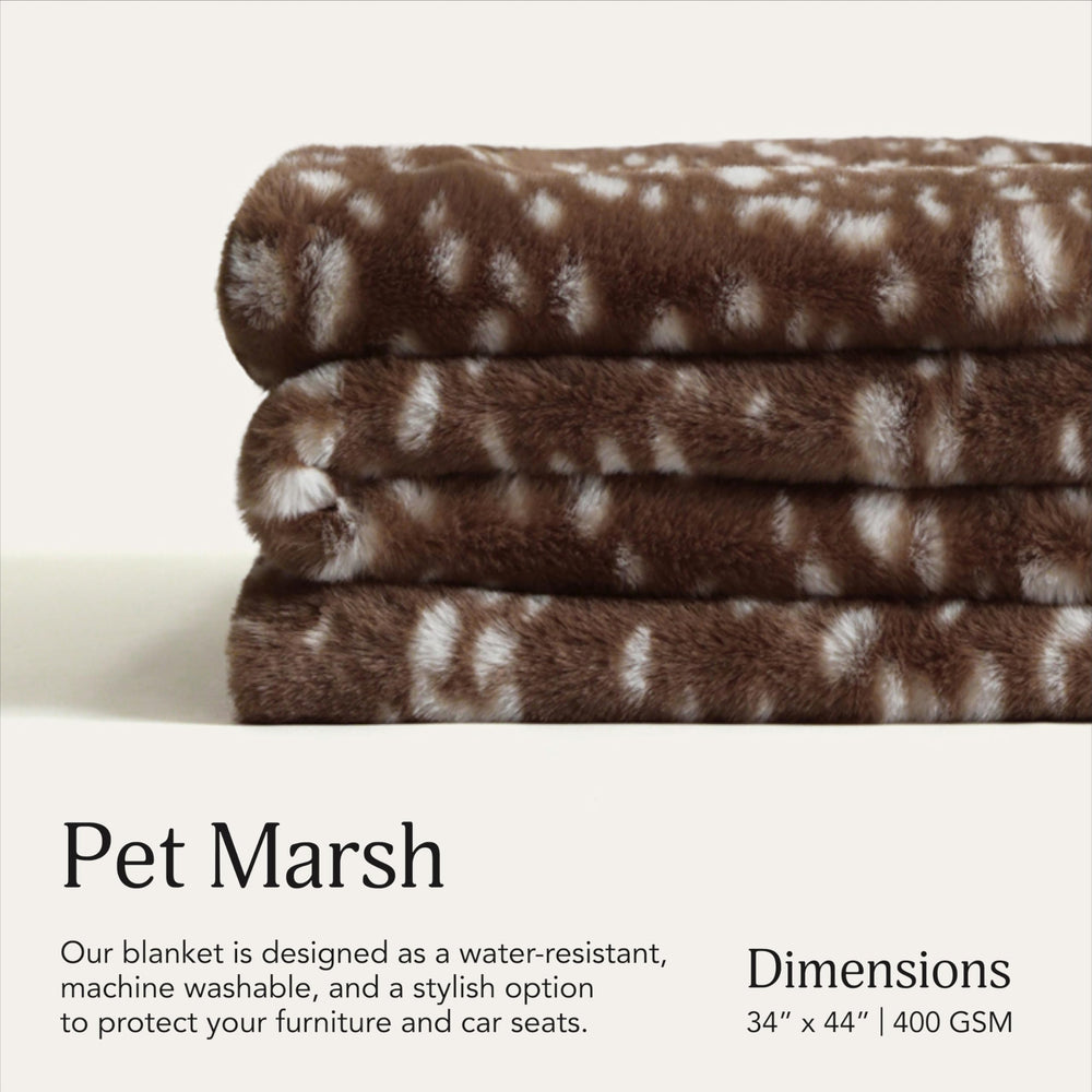 UnHide Lil’ Pet Marsh blanket folded 34x44 shows portable warmth for trips.