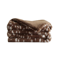 UnHide Lil’ Pet Marsh blanket on couch offers cozy protection from fur and spills.