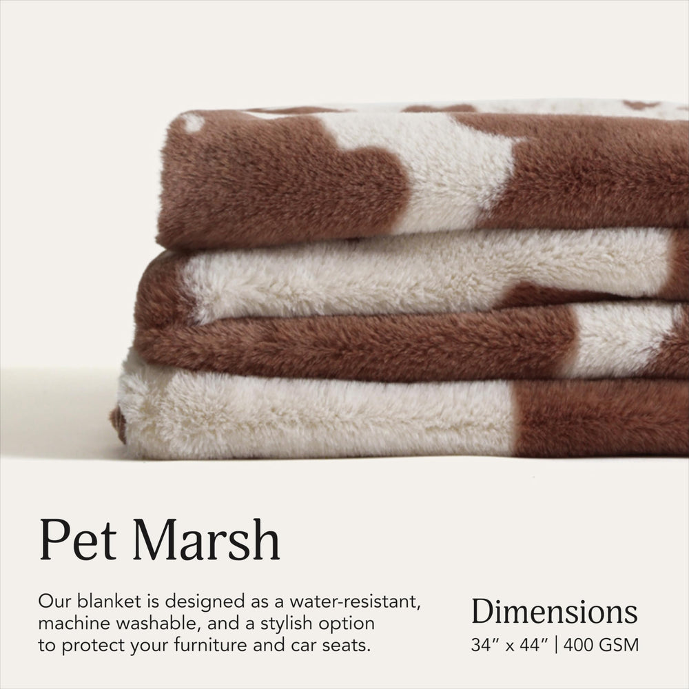 UnHide Lil’ Pet Marsh on sofa shows furniture protection and pet comfort.