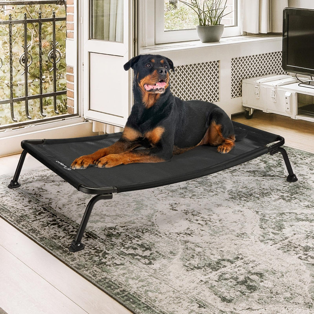Veehoo spacious bed supports up to 150 lbs for big dogs.