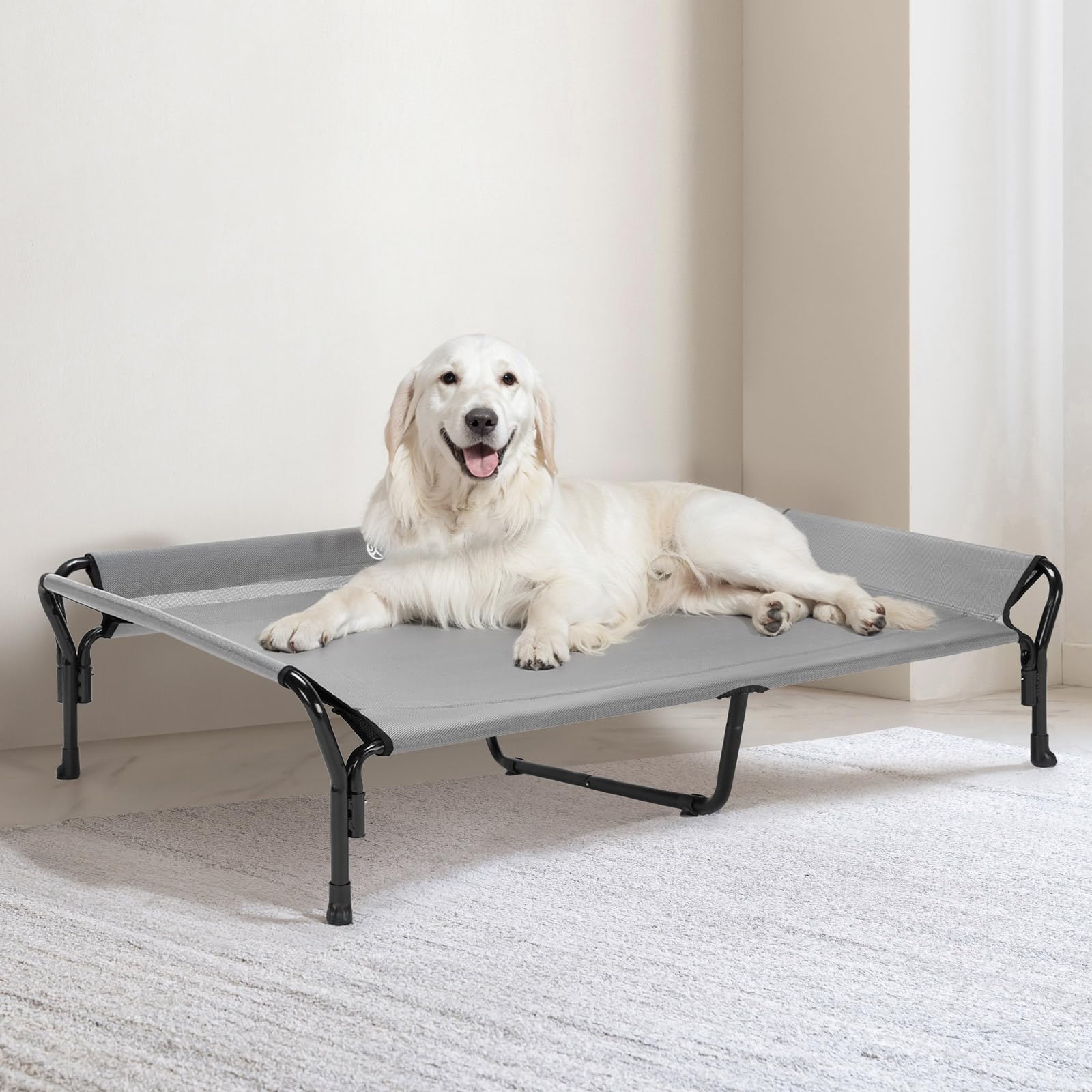 Veehoo bed outdoors on grass with dog lounging comfortably