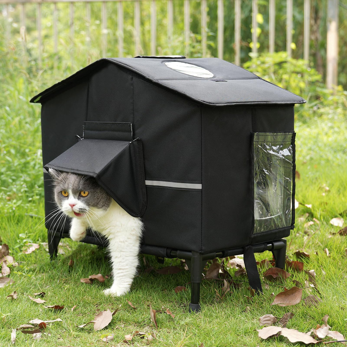 Veehoo Outdoor Cat House elevated bed keeps feral cats dry and warm.