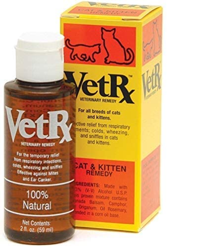 VET RX cat nose drops being applied to a cat's nose for kitten relief.
