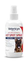 Vetericyn Plus Hot Spot Spray applied to a dog's sore area for soothing relief.