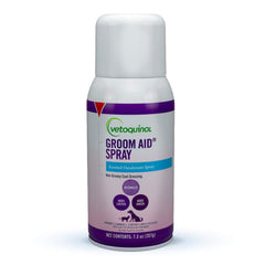 Vetoquinol Groom-Aid spray bottle demonstrates detangling and deodorizing action on a pet coat.