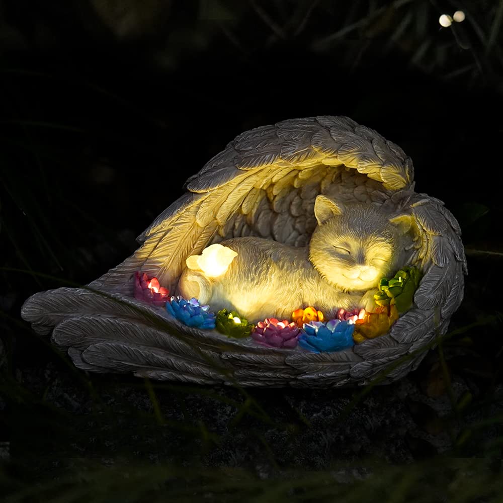VKEVOC cat memorial stone with solar-winged angel lights the garden at night