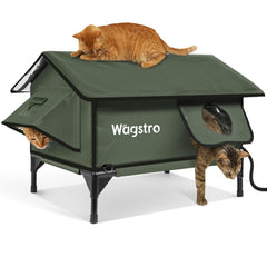 Wagstro Gable heated cat shelter outdoors in olive green; keeps feral cats warm outdoors.