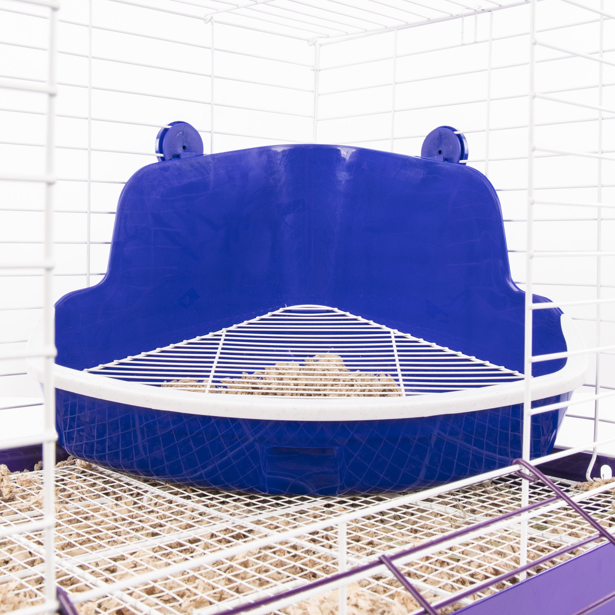 Ware Manufacturing Lock-N-Litter pan attached to cage promotes spill-free potty training.