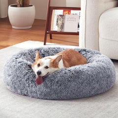 Warmrest donut dog bed outer view shows round grey design with cozy support