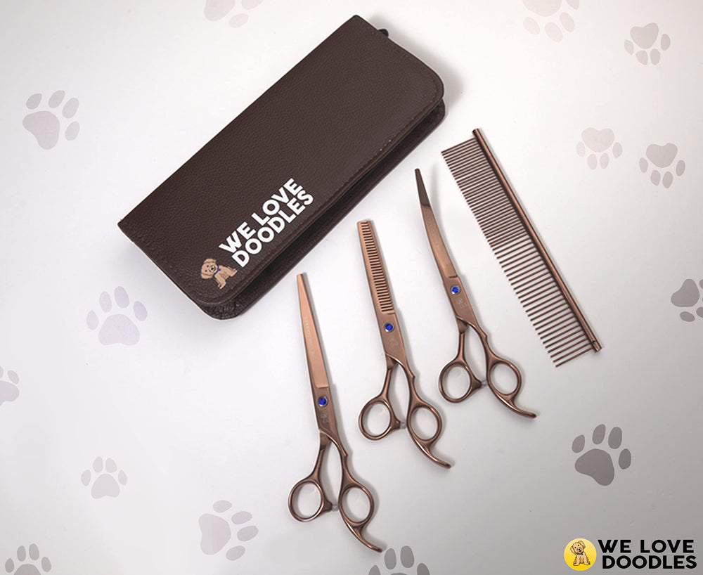 We Love Doodles curved grooming scissor for contour cuts around ears and eyes.