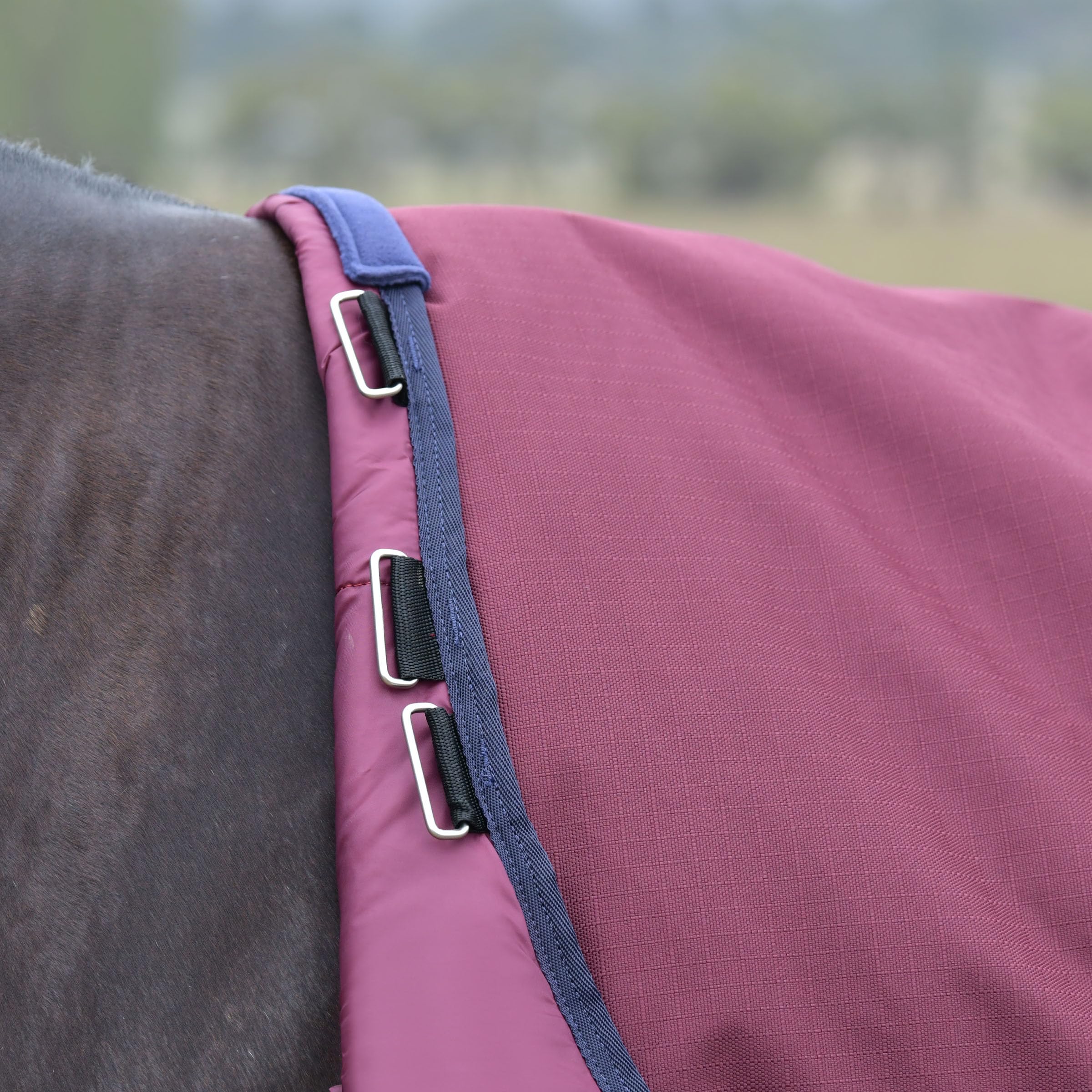 WeatherBeeta ComFiTec Essential Turnout large tail flap shields wind and rain.