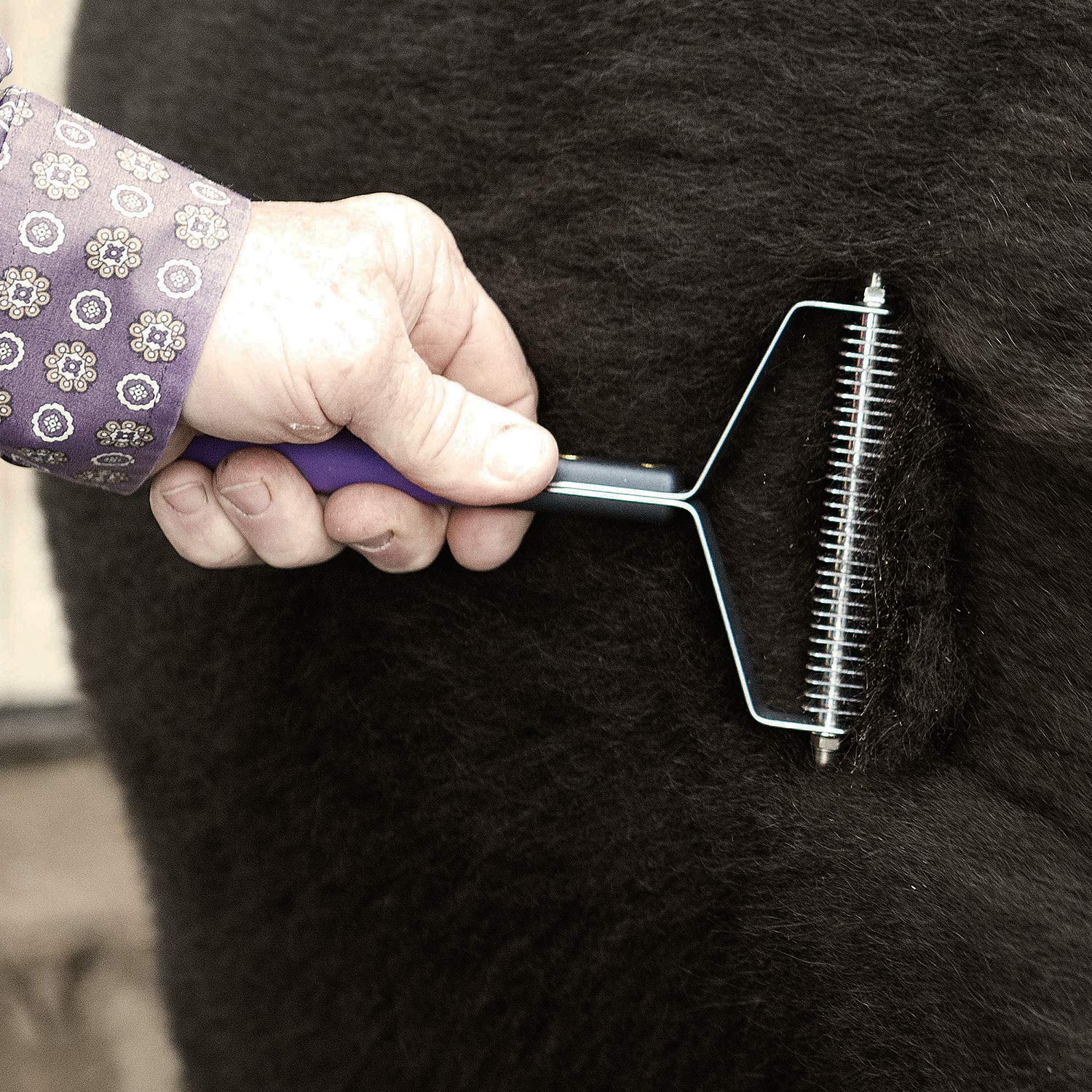 Weaver Leather Livestock Shedding Comb closeup shows durable stainless steel teeth for long-lasting grooming.