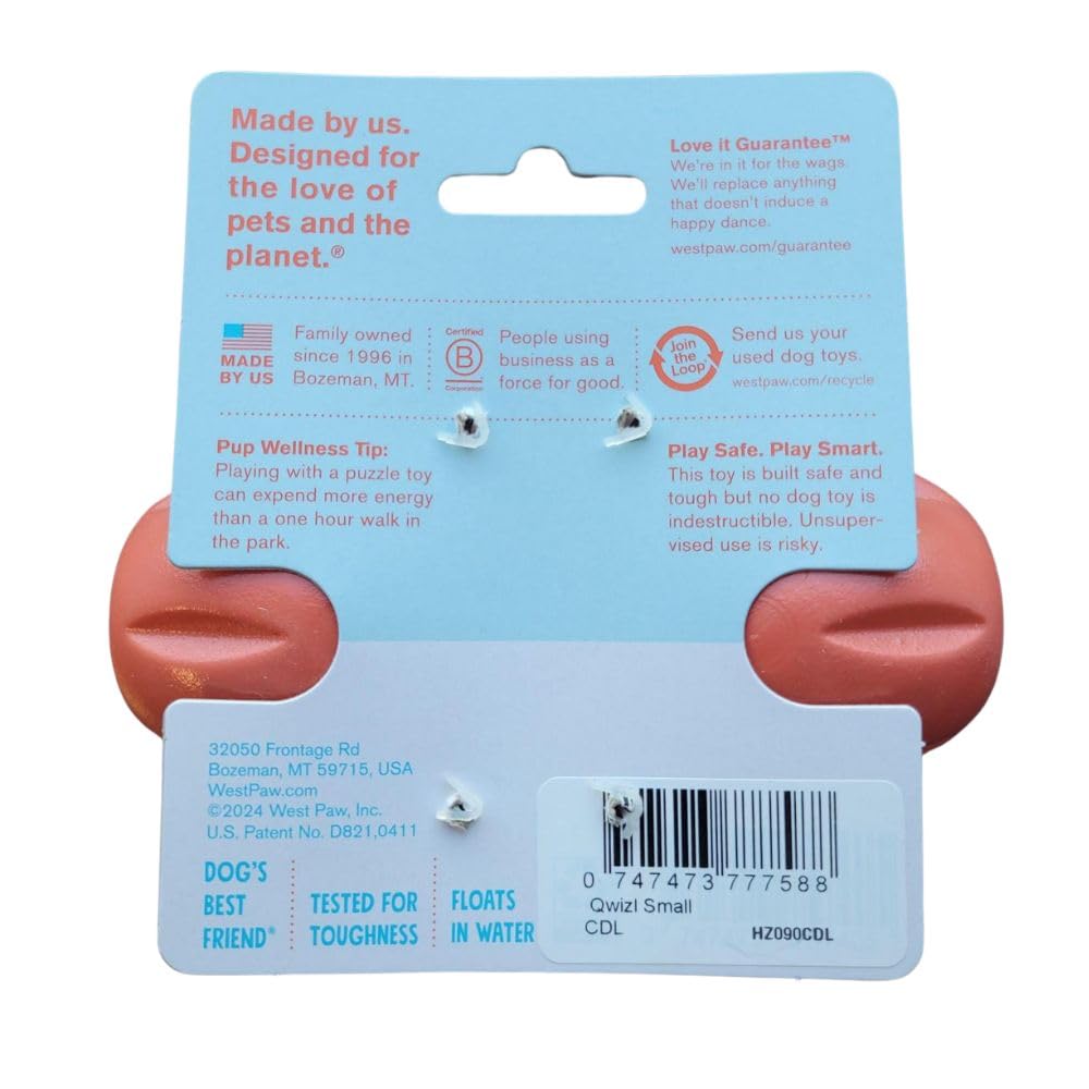 West Paw Qwizl Small Cardinal toy in action, ideal for fetch and mental engagement.