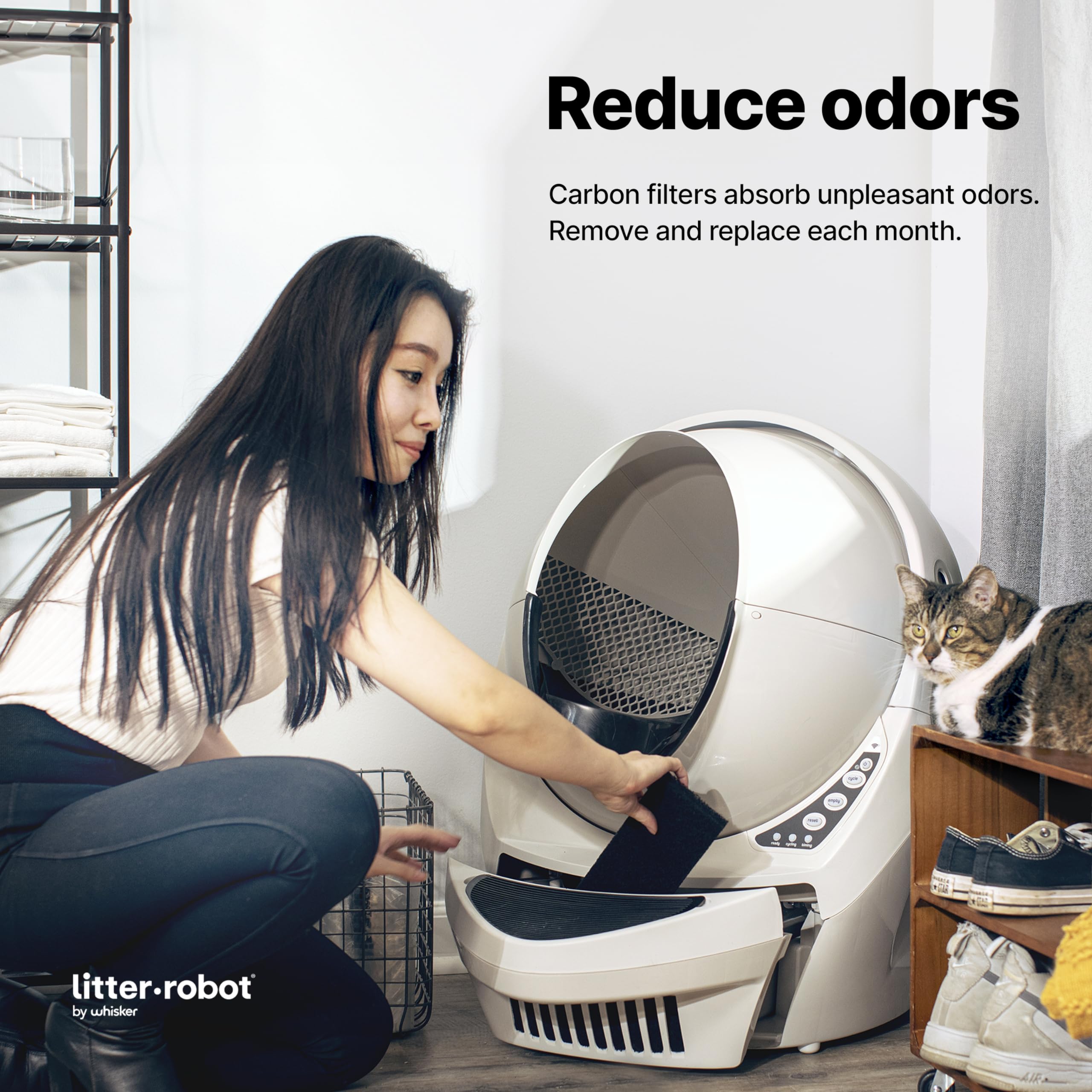 Whisker Litter-Robot 3 waste-drawer filter attachment demonstrates easy replacement.