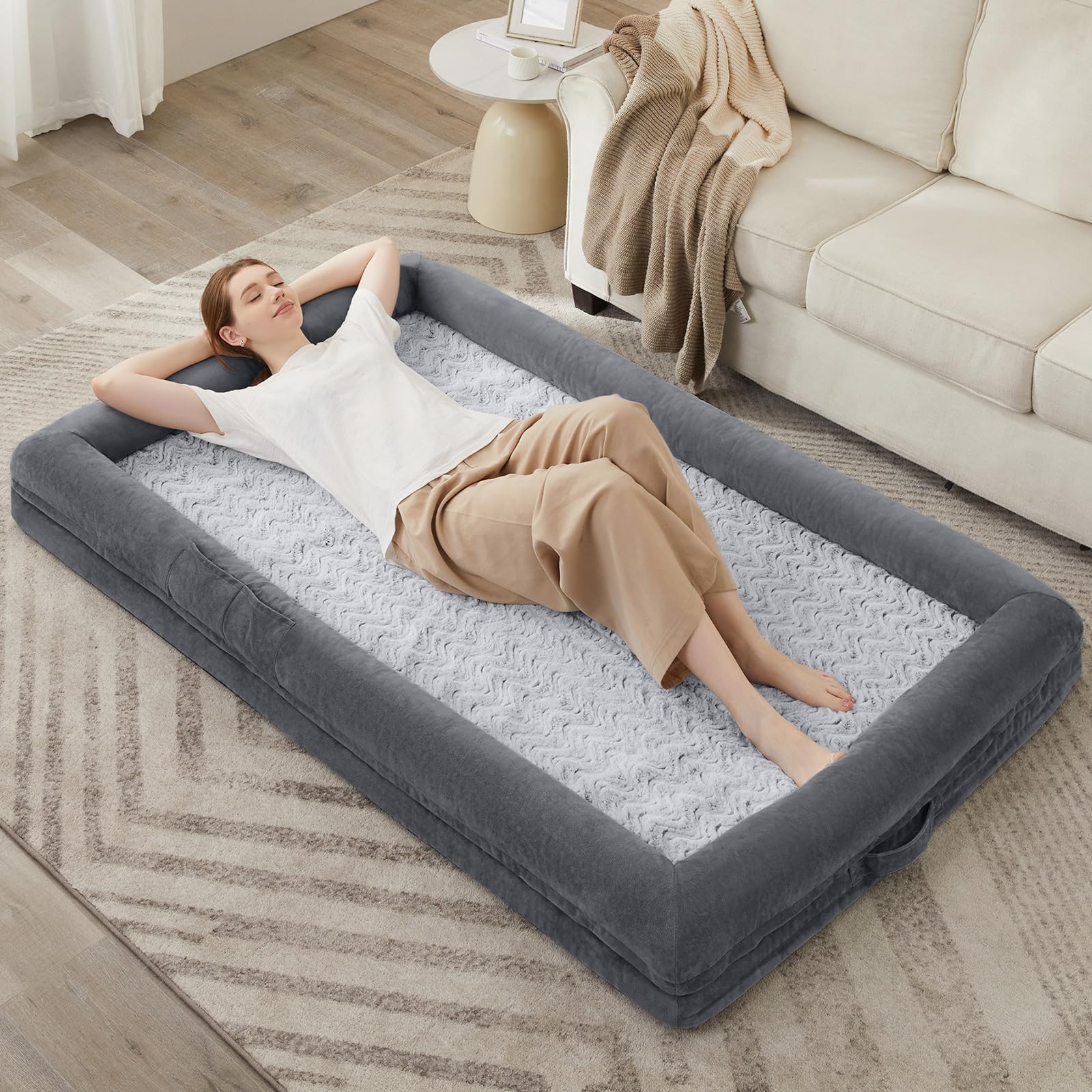 WNPETHOME in-use image shows a dog resting calmly on the premium sofa bed.