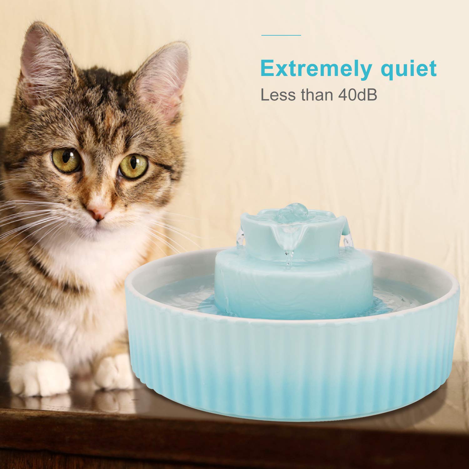 Wonder Creature Cupcake fountain with pets demonstrates indoor use in multi-pet homes.