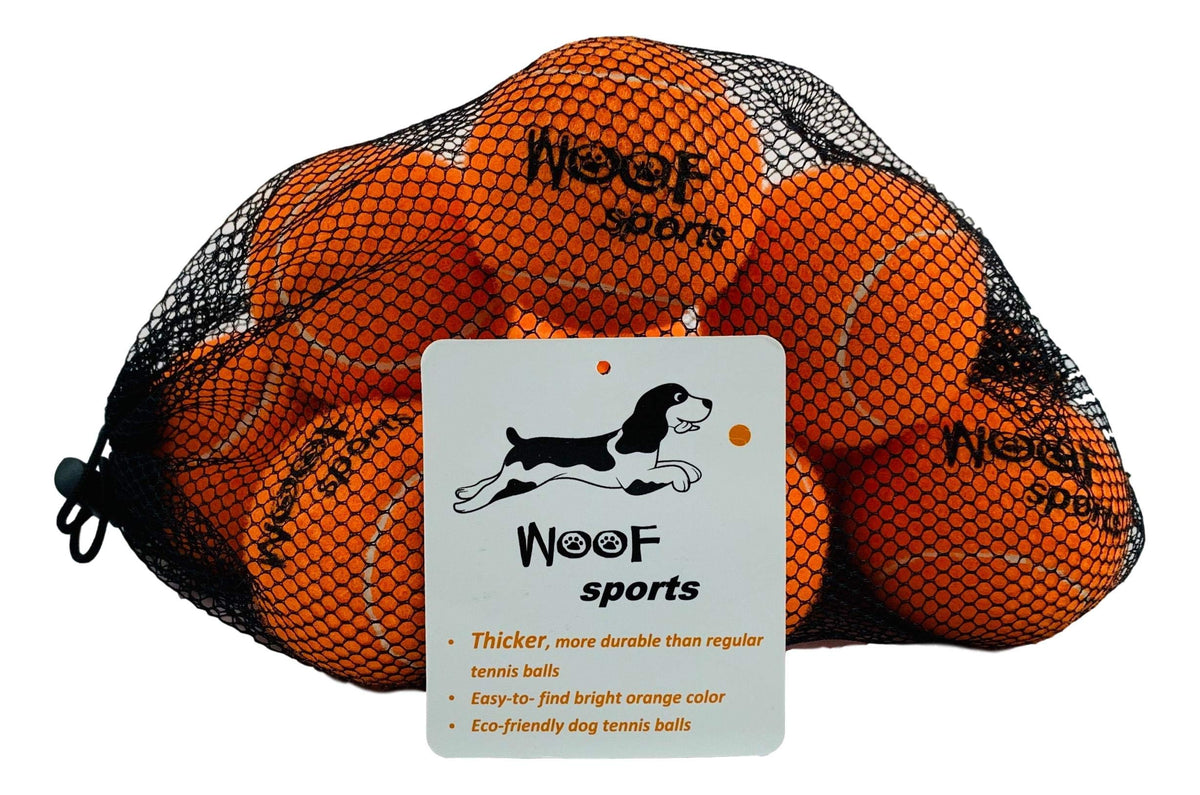 Woof Sports dog tennis balls orange pack, high-visibility fetch for grassy yards.