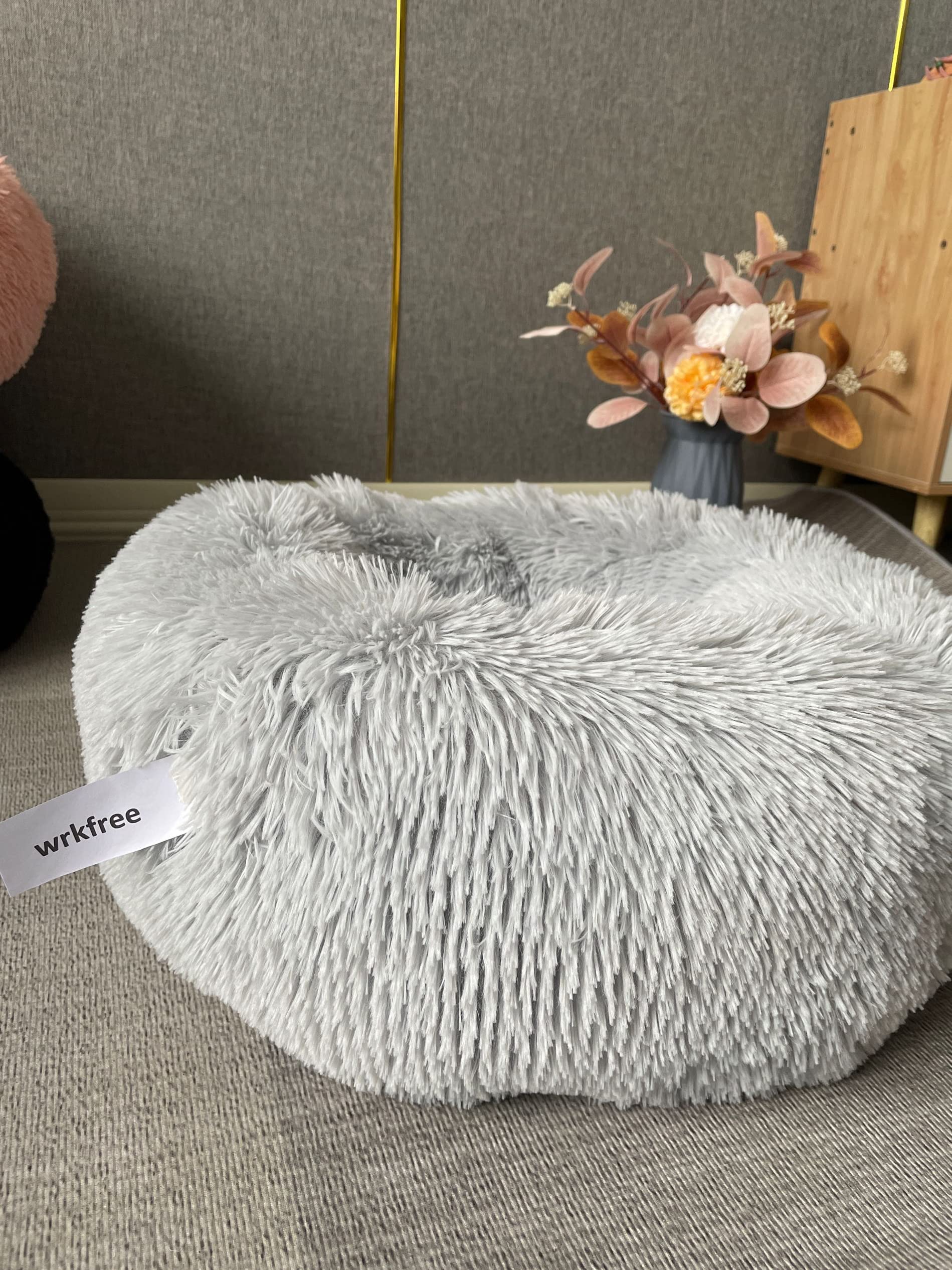 wrkfree donut dog bed anti-slip bottom keeps the bed secure on indoor floors.