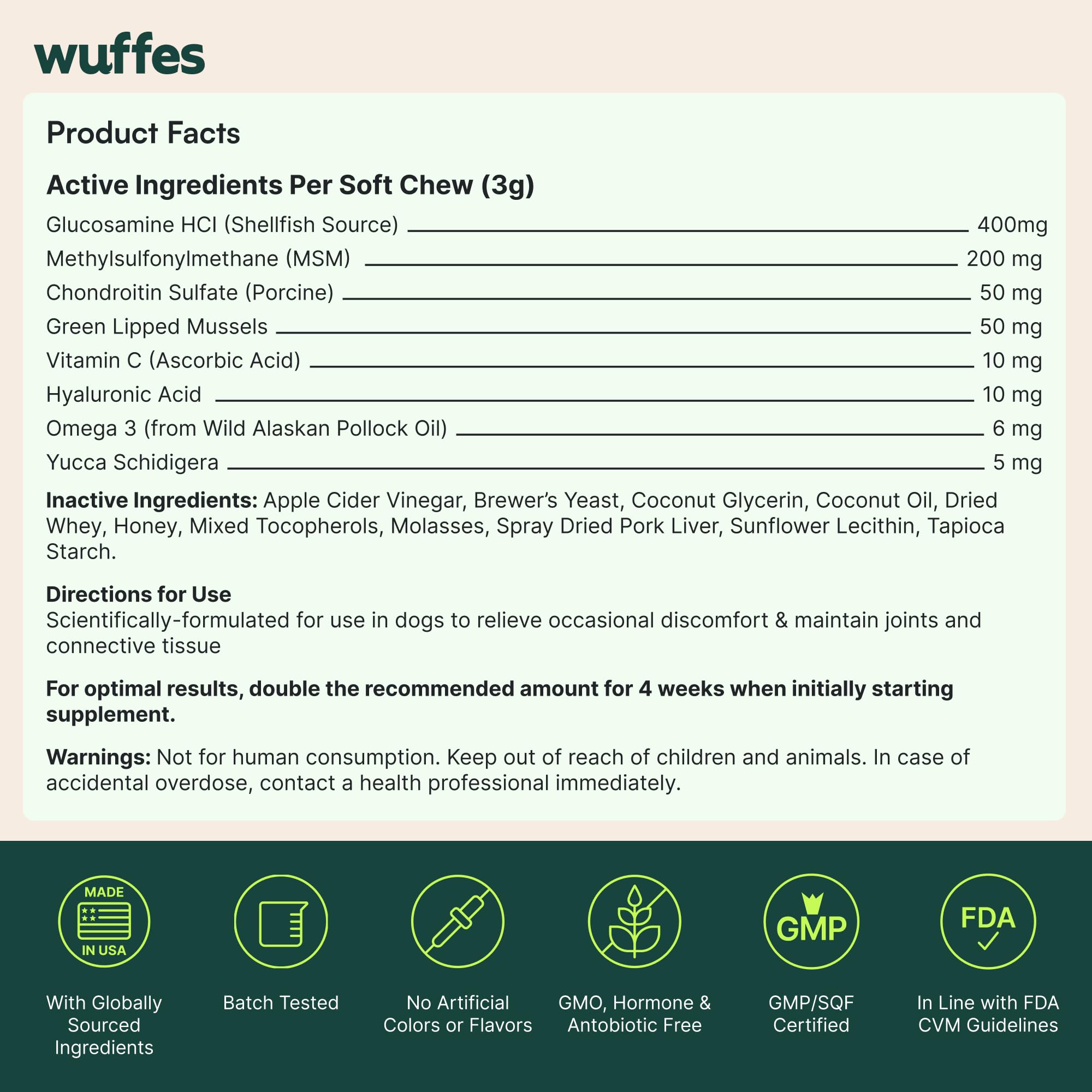 Wuffes Pet owner hand holding chews for daily use