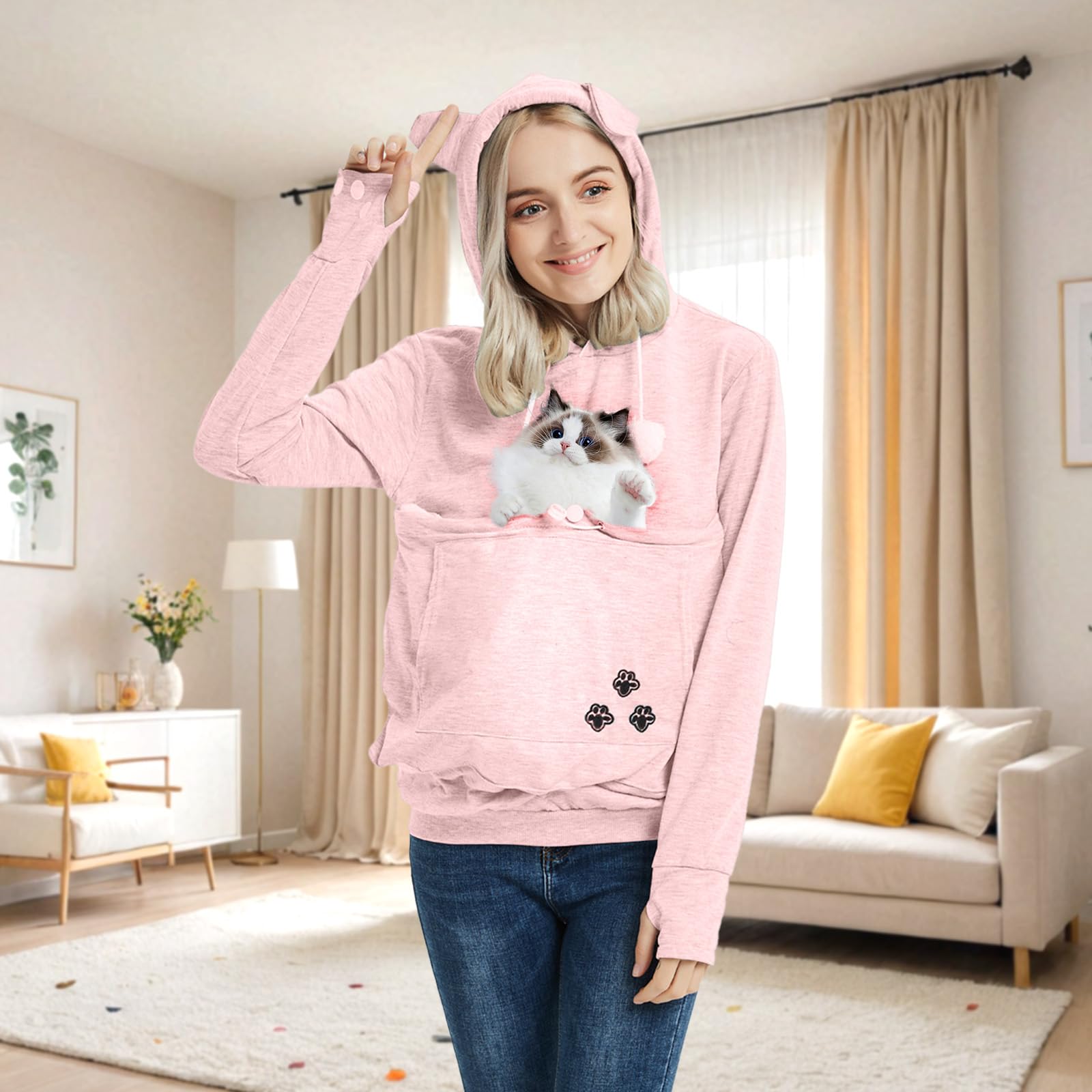 XUDREZ pink hoodie worn during outings enables hands-free pet transport.