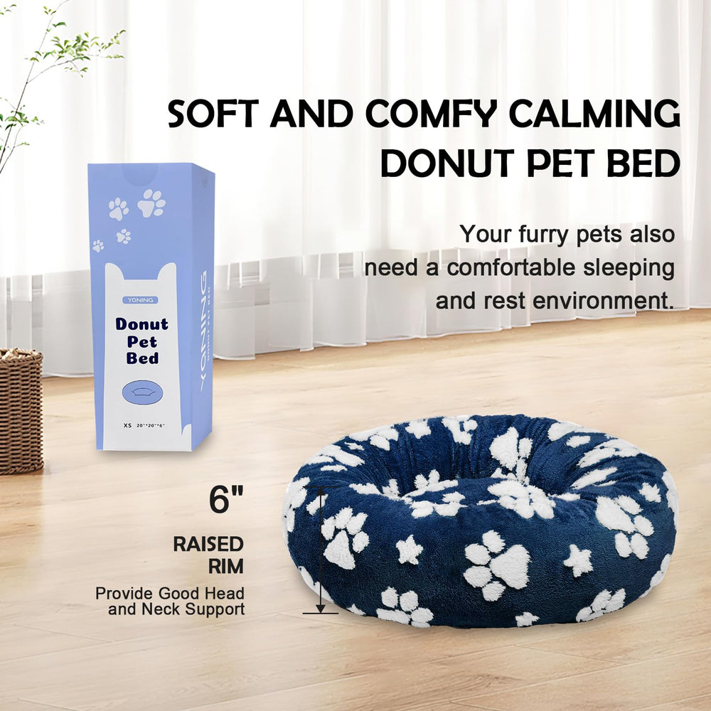 Yaning Donut Bed raised rim supports head and neck comfort.