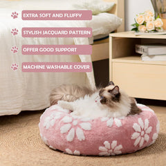 Yaning donut bed pink features raised neck support for comfort.