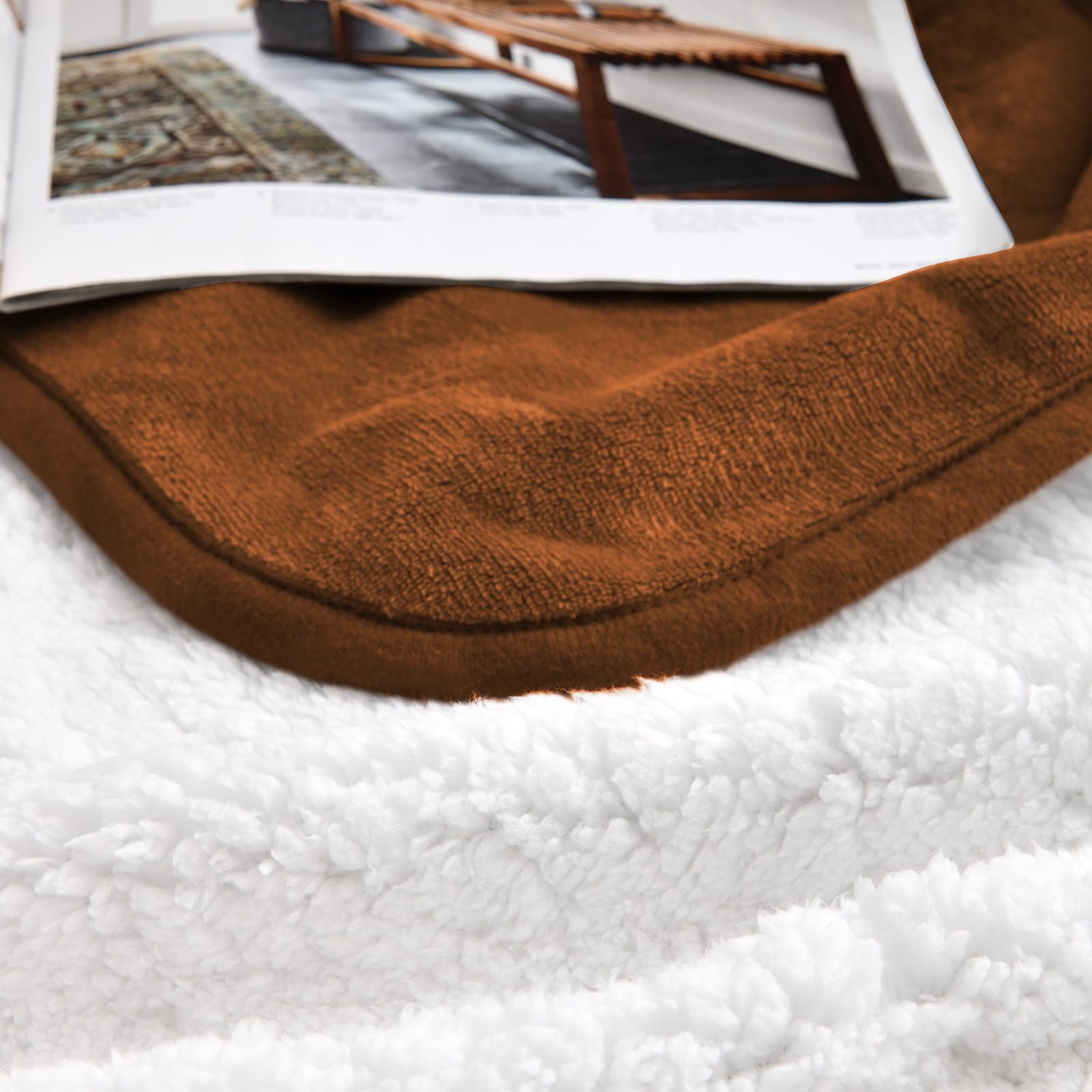 Yaning sherpa fleece blanket demonstrates soft, luxurious warmth for couches and chairs.
