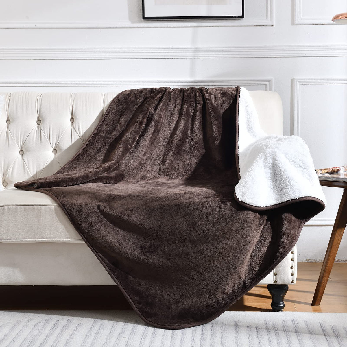 Yaning waterproof blanket on bed or couch protects against spills and pet fur.
