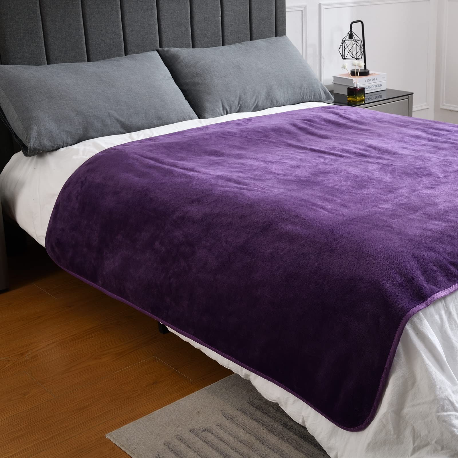 Yaning waterproof blanket used indoors or in a car for protection.