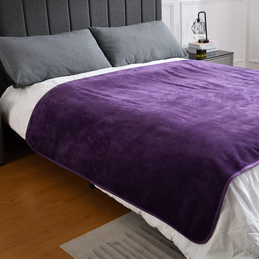 Yaning waterproof blanket used indoors or in a car for protection.