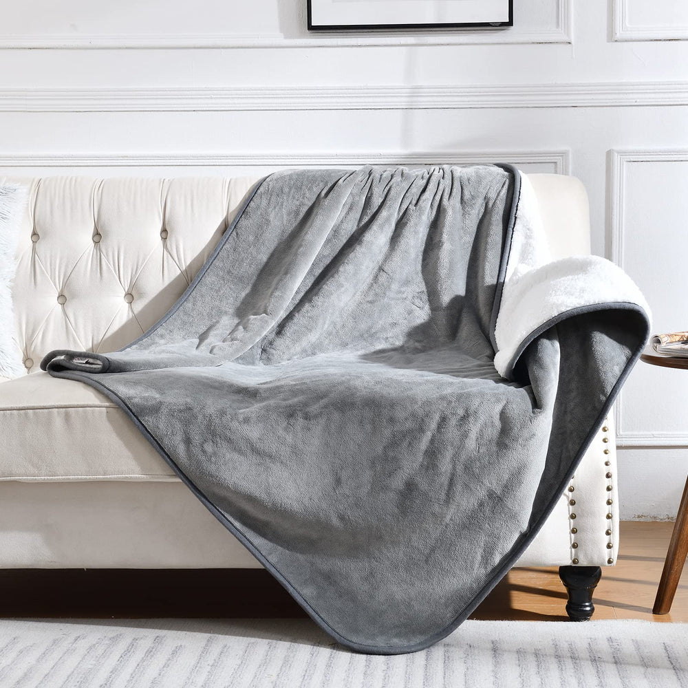Yaning waterproof blanket closeup shows waterproof lining protecting furniture from spills