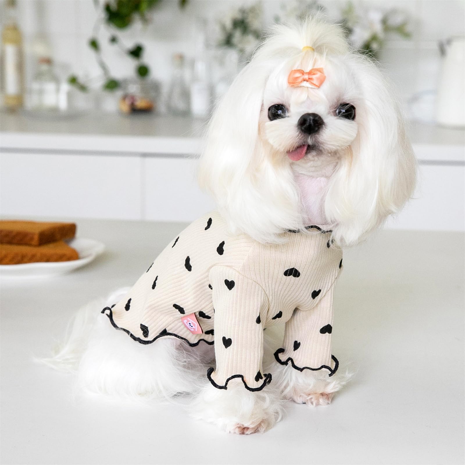 Yaopelky heart print shirt stretched on a small dog demonstrates flexible fit