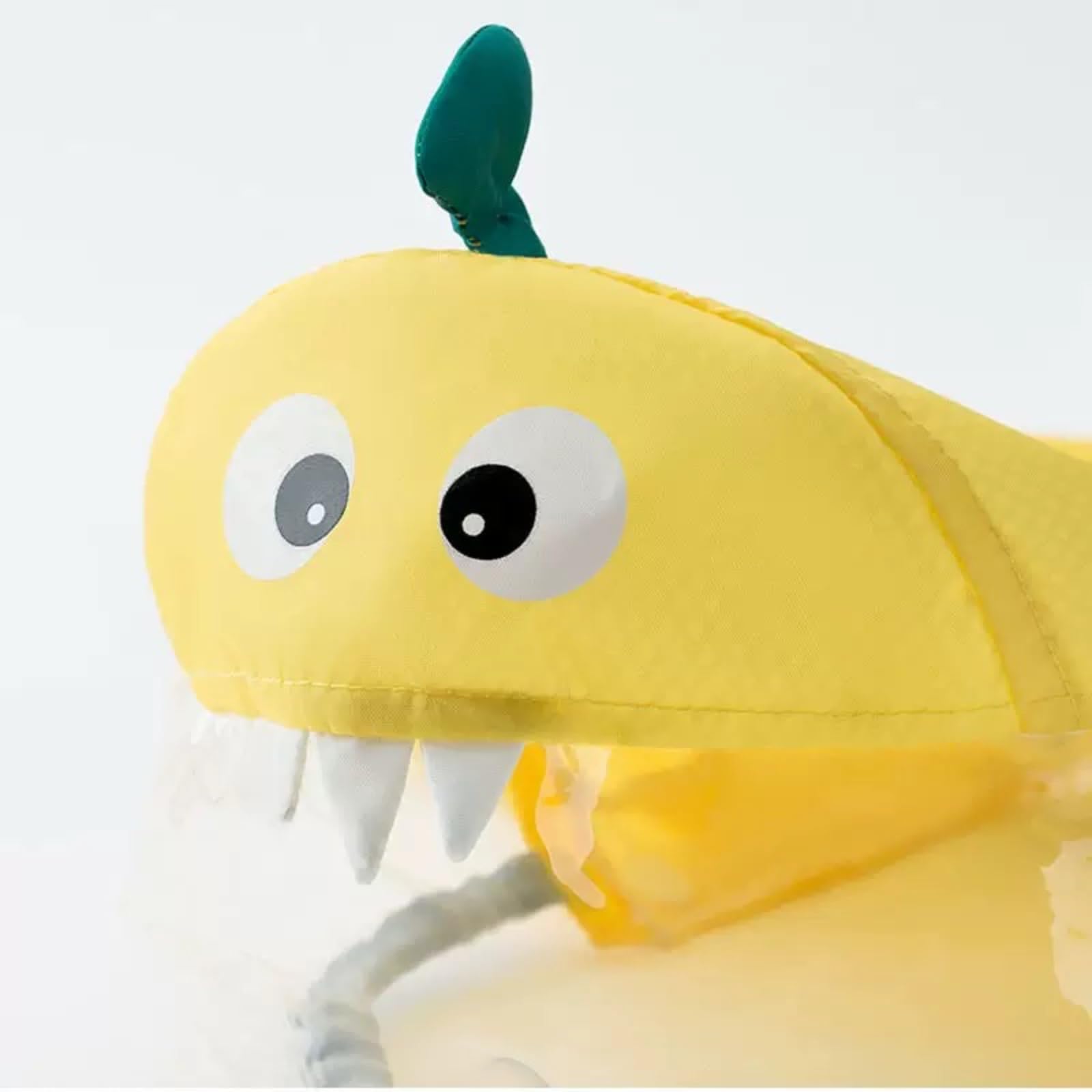 Yellow Dinosaur dog raincoat featuring pineapple-print adds bright, playful style to every walk.