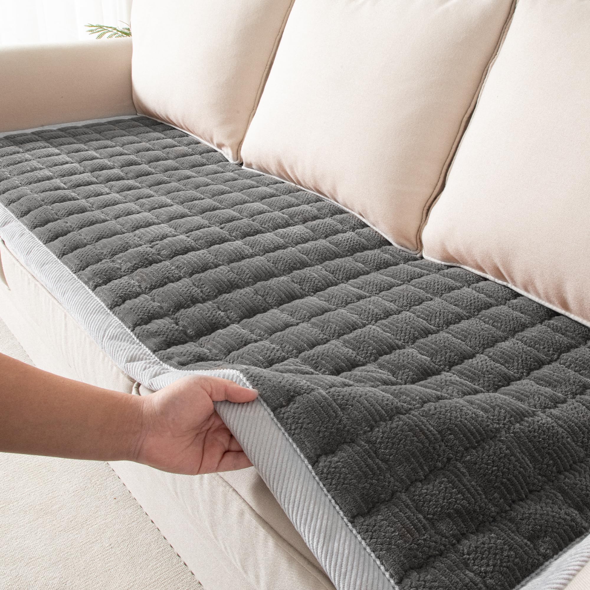YJSMMXY couch cover soft-flannel delivers cozy pet comfort on the sofa.