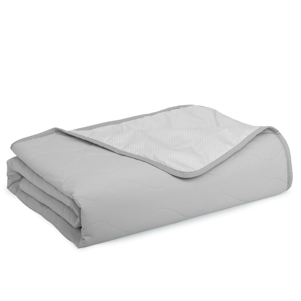 ZAKAPAWS cooling blanket on a sofa with a dog for cooling comfort