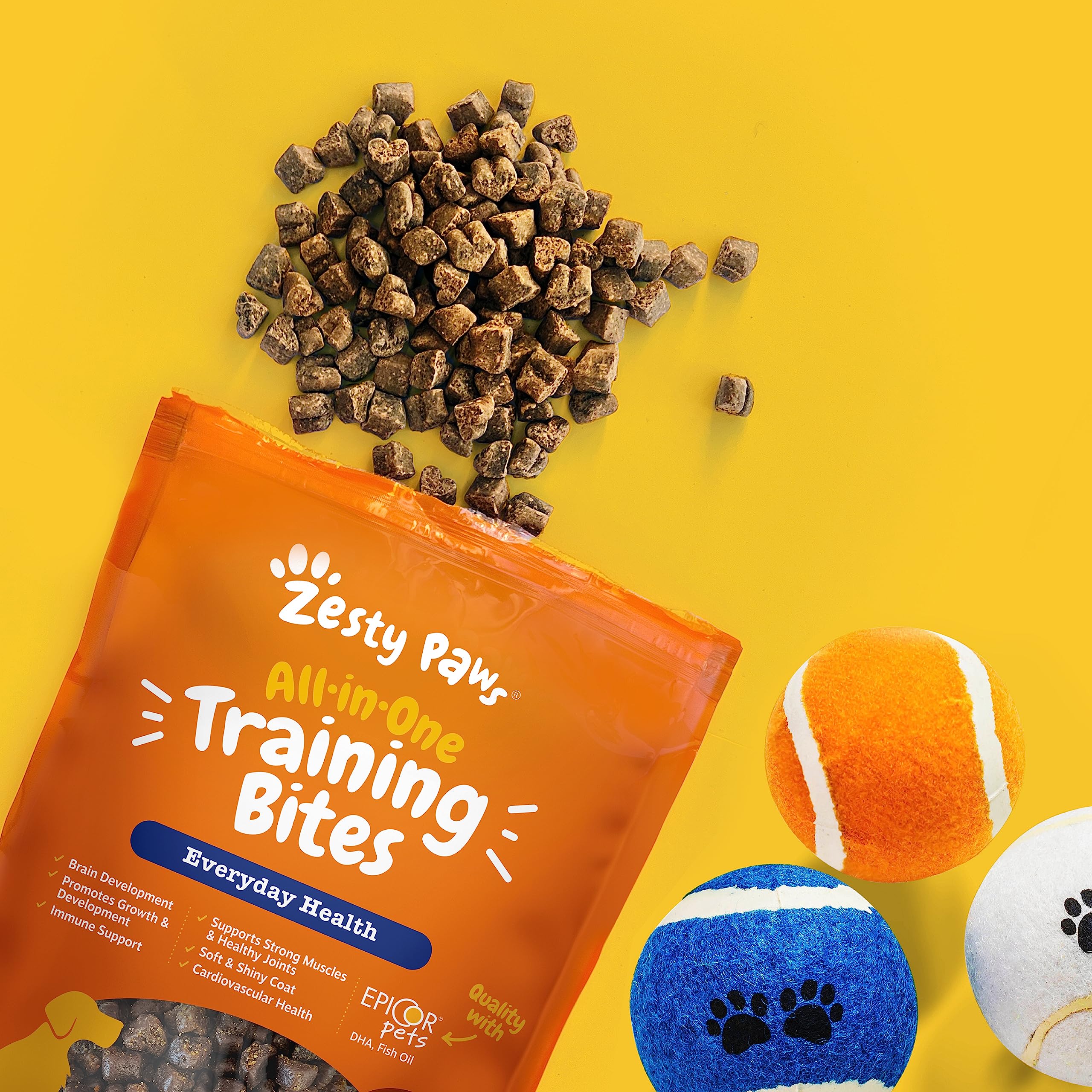 Zesty Paws Training Treats all breeds and ages concept shown with diverse dogs.
