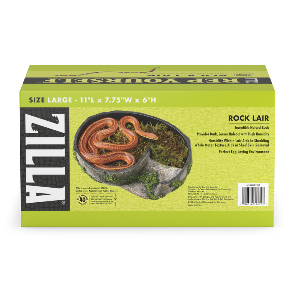 Zilla Rock Lair inside terrarium demonstrates a secure, humidity-friendly hide for thriving reptiles