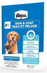 Zinpro Boréal zinc supplement powder being sprinkled into a dog's bowl for skin support.