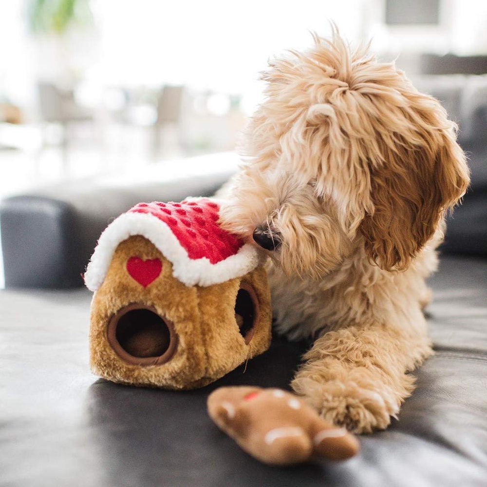 ZippyPaws Burrow gingerbread house soft plush provides cozy play experience.