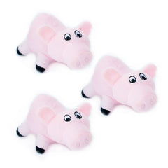ZippyPaws Burrow Squeaky Pigs closeup — plush texture and squeaker for small-dog play.