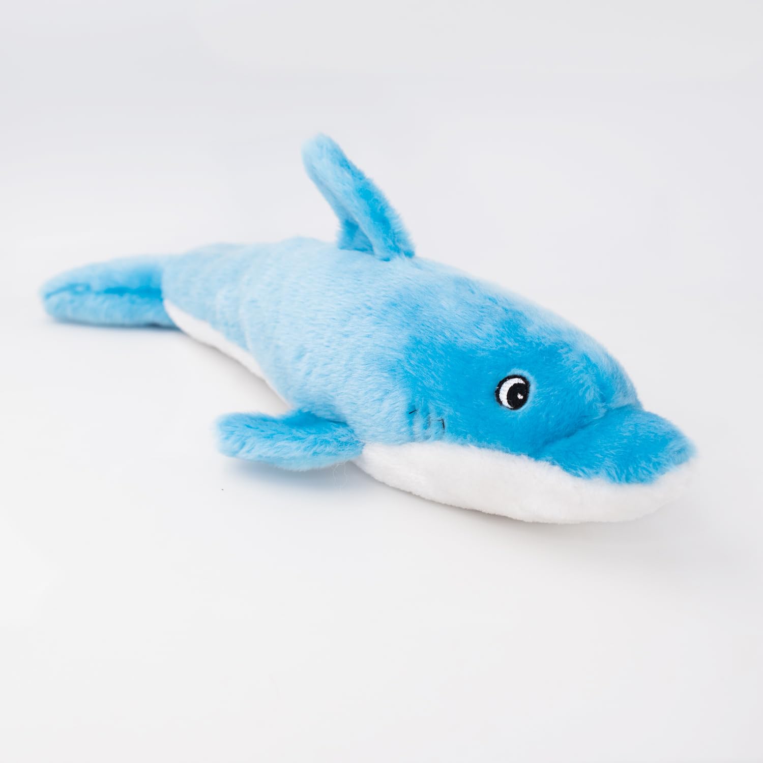 Delfín azul con sonido Jigglerz para perros, ideal para horas de juego.